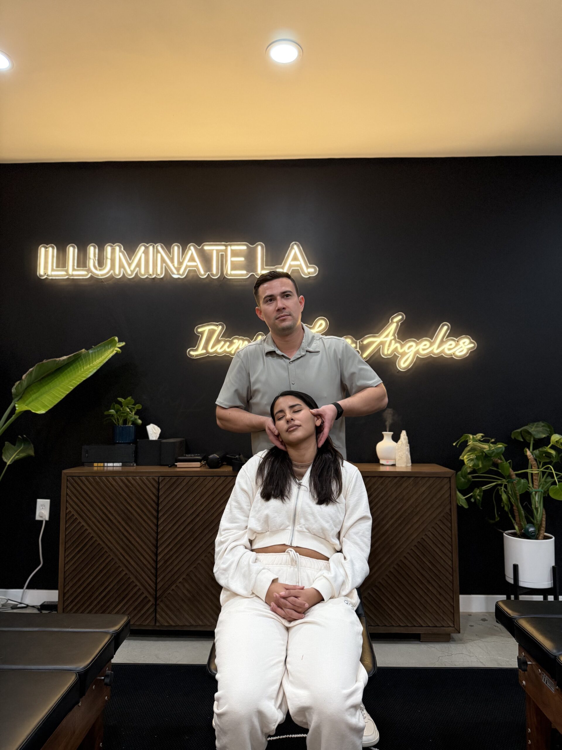 client in session with chiropractor